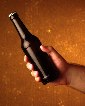Hand-Holding-Bottle-Of-Beer